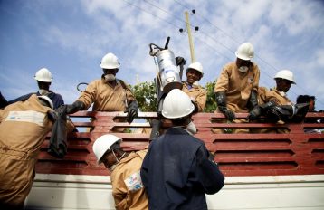 IRS spray team unload their truck during IRS campaign, Ethiopia 2014